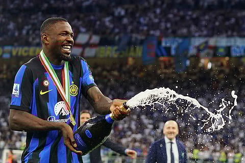 Marcus Thuram celebrates Serie A victory
